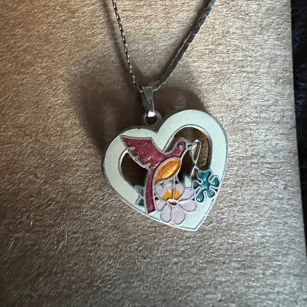 Long enamel and metal heart pendant necklace